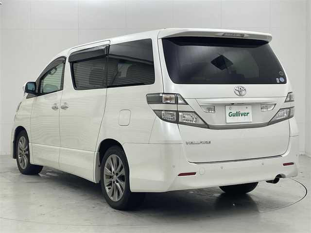 トヨタ ヴェルファイア 2．4Z プラチナセレクションⅡ 茨城県 2010(平22)年 6.6万km ホワイトパールクリスタルシャイン 純正ナビ/CD/DVD/AUX/フルセグTV/アルパイン後席フリップダウンモニター/バックカメラ/スペアキー/ETC/両側パワースライドドア/パワーバックドア/純正18インチAW/オットマン/社外フロアマット