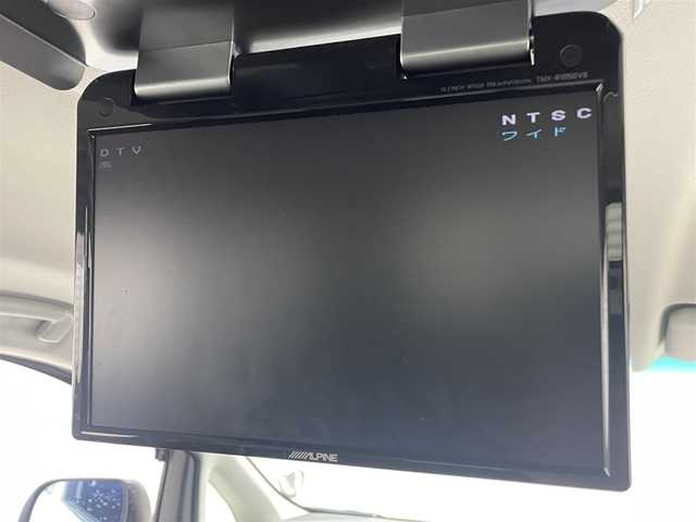 トヨタ ヴェルファイア 2．4Z プラチナセレクションⅡ 茨城県 2010(平22)年 6.6万km ホワイトパールクリスタルシャイン 純正ナビ/CD/DVD/AUX/フルセグTV/アルパイン後席フリップダウンモニター/バックカメラ/スペアキー/ETC/両側パワースライドドア/パワーバックドア/純正18インチAW/オットマン/社外フロアマット