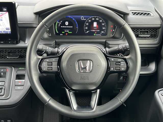 ホンダ ステップワゴン スパーダ eHEV 茨城県 2023(令5)年 1.3万km スーパープラチナグレーメタリック ホンダセンシング/衝突軽減ブレーキ（CMBS）/誤発進抑制機能/後方誤発進抑制機能/近距離衝突軽減ブレーキ/歩行者事故低減ステアリング/路外逸脱抑制機能/渋滞追従機能付アダプティブクルーズコントロール（ACC）/車線維持支援システム（LKAS）/先行車発進お知らせ機能/オートハイビーム/アダプティブドライビングビーム/メーカーOP・SDナビ/両側パワースライドドア/パワーバックドア/ハーフレザーシート/シートヒーター/ETC/電子パーキング/オートホールド機能/ブラインドスポットインフォメーション/LEDオートヘッドライト/全列USBチャージャー/ドライブレコーダー（DRH-229ND）/スパーダ専用16インチアルミホイール