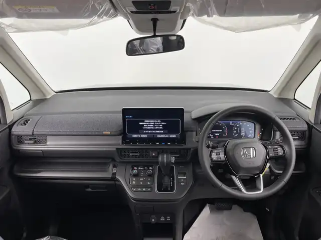 ホンダ ステップワゴン エアー EX 大分県 2025(令7)年 0.1千km クリスタルブラックパール 登録済未使用車/7人乗り/ホンダセンシング/・衝突軽減ブレーキ/・先行車発進お知らせ機能/・歩行者事故低減ステアリング/・路外逸脱抑制機能/・標識認識機能/・渋滞追従機能付アダプティブクルーズコントロール/・車線維持支援システム/・トラフィックジャムアシスト/・ブラインドスポットインフォメーション/・誤発進抑制機能/・後方誤発進抑制機能/・近距離衝突軽減ブレーキ/・急アクセル抑制機能/・パーキングセンサーシステム/・オートハイビーム/純正11.4型ナビ　型式：LXM-247VFLi/・フルセグTV、DVD再生可、BT対応、USB/・AppleCarPlay、AndroidAuto/ステアリングスイッチ/バックカメラ/両側電動スライドドア/パワーテールゲート（メモリー機能付）/前席シートヒーター/2列目オットマン/パドルシフト/横滑り防止装置/電動格納ミラー/オートライト/LEDヘッドライト/LEDフォグ/純正16インチアルミホイール/保証書、取説、スペアキー有り