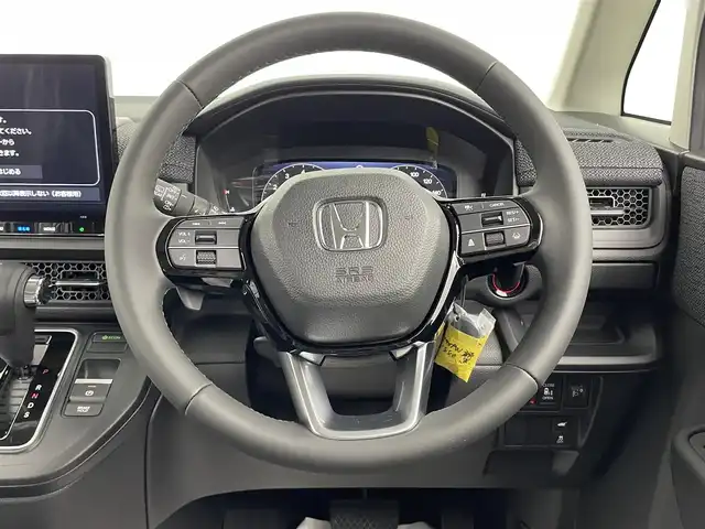 ホンダ ステップワゴン エアー EX 大分県 2025(令7)年 0.1千km クリスタルブラックパール 登録済未使用車/7人乗り/ホンダセンシング/・衝突軽減ブレーキ/・先行車発進お知らせ機能/・歩行者事故低減ステアリング/・路外逸脱抑制機能/・標識認識機能/・渋滞追従機能付アダプティブクルーズコントロール/・車線維持支援システム/・トラフィックジャムアシスト/・ブラインドスポットインフォメーション/・誤発進抑制機能/・後方誤発進抑制機能/・近距離衝突軽減ブレーキ/・急アクセル抑制機能/・パーキングセンサーシステム/・オートハイビーム/純正11.4型ナビ　型式：LXM-247VFLi/・フルセグTV、DVD再生可、BT対応、USB/・AppleCarPlay、AndroidAuto/ステアリングスイッチ/バックカメラ/両側電動スライドドア/パワーテールゲート（メモリー機能付）/前席シートヒーター/2列目オットマン/パドルシフト/横滑り防止装置/電動格納ミラー/オートライト/LEDヘッドライト/LEDフォグ/純正16インチアルミホイール/保証書、取説、スペアキー有り