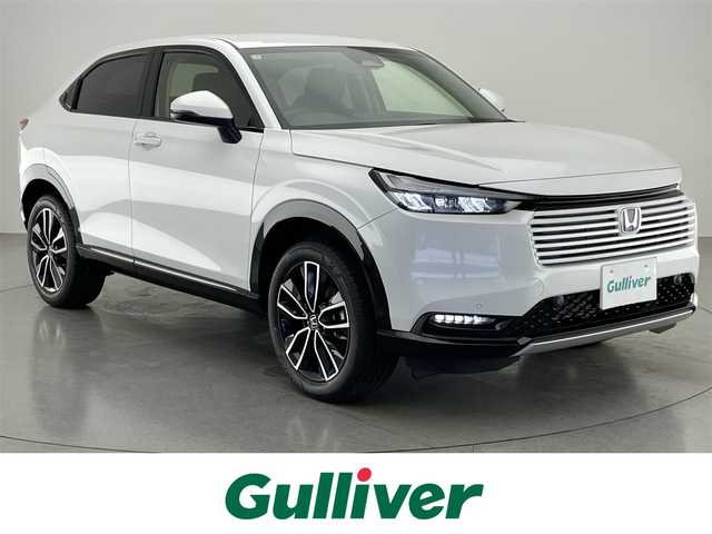 ホンダ ヴェゼル ハイブリッド e:HEV Z 愛知県 2025(令7)年 0.1万km未満 プラチナホワイトパール 純９型ナビ　フルセグＴＶ　Ｂｌｕｅｔｏｏｔｈ　バックカメラ　ホンダセンシング　ワイヤレス充電　ＥＴＣ２．０　後退出庫サポート　衝突軽減　追従クルコン　シートヒーター　ＢＳＭ　パワーバックドア　禁煙車/e:HEV Z　3VC4AG3　Honda CONNECTディスプレー+ETC2.0車載器+ワイヤレス充電器(220/000)