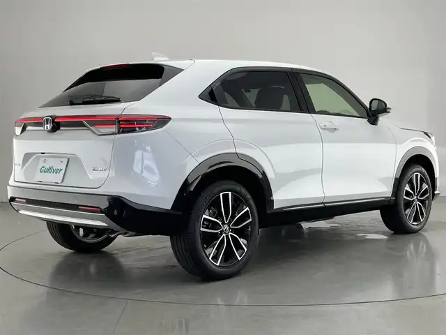 ホンダ ヴェゼル ハイブリッド e:HEV Z 愛知県 2025(令7)年 0.1万km未満 プラチナホワイトパール 純９型ナビ　フルセグＴＶ　Ｂｌｕｅｔｏｏｔｈ　バックカメラ　ホンダセンシング　ワイヤレス充電　ＥＴＣ２．０　後退出庫サポート　衝突軽減　追従クルコン　シートヒーター　ＢＳＭ　パワーバックドア　禁煙車/e:HEV Z　3VC4AG3　Honda CONNECTディスプレー+ETC2.0車載器+ワイヤレス充電器(220/000)