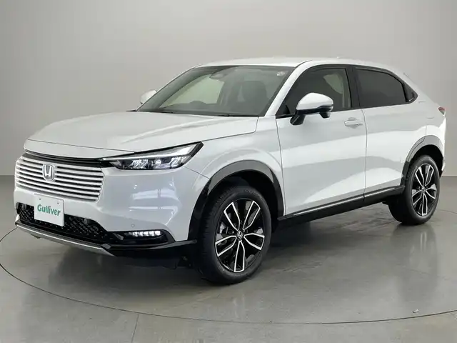 ホンダ ヴェゼル ハイブリッド e:HEV Z 愛知県 2025(令7)年 0.1万km未満 プラチナホワイトパール 純９型ナビ　フルセグＴＶ　Ｂｌｕｅｔｏｏｔｈ　バックカメラ　ホンダセンシング　ワイヤレス充電　ＥＴＣ２．０　後退出庫サポート　衝突軽減　追従クルコン　シートヒーター　ＢＳＭ　パワーバックドア　禁煙車/e:HEV Z　3VC4AG3　Honda CONNECTディスプレー+ETC2.0車載器+ワイヤレス充電器(220/000)