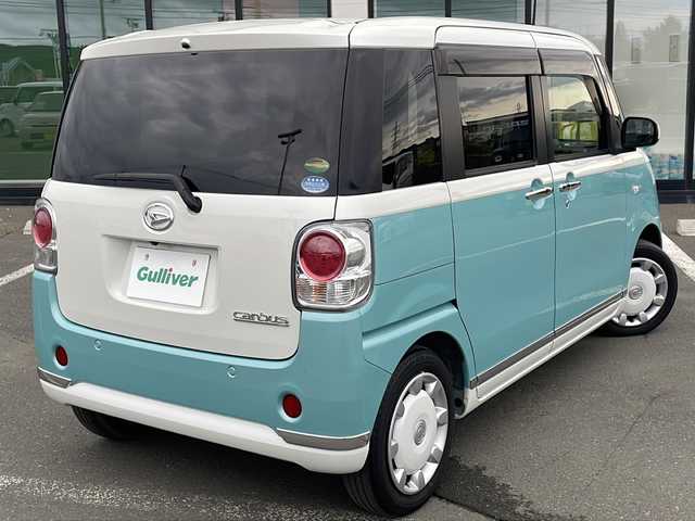 ダイハツ ムーヴ キャンバス G メイクアップ リミテッド　SAⅢ 道東・釧路十勝 2019(平31)年 5.8万km パールホワイトⅢ/ファインミントメタリック 2トーン ・４WD/・純正メモリナビ/（ＢＴ　ＣＤ　ＤＶＤ　ＵＳＢ）/・全方位カメラ　　/・両側パワースライドドア/・衝突被害軽減ブレーキ/・横滑り防止装置　/・オートライト/・オートマチックハイビーム/・ＬＥＤヘッドライト/・ＥＴＣ　/・運転席シートヒーター/・スマートキー/・プッシュスタート/・純正フロアマット/・テレビキャンセラー/・フロントワイパーデアイサー