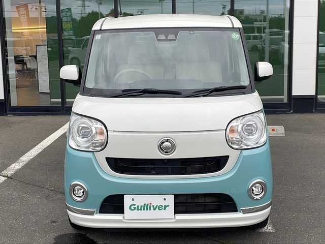 ダイハツ ムーヴ キャンバス G メイクアップ リミテッド　SAⅢ 道東・釧路十勝 2019(平31)年 5.8万km パールホワイトⅢ/ファインミントメタリック 2トーン ・４WD/・純正メモリナビ/（ＢＴ　ＣＤ　ＤＶＤ　ＵＳＢ）/・全方位カメラ　　/・両側パワースライドドア/・衝突被害軽減ブレーキ/・横滑り防止装置　/・オートライト/・オートマチックハイビーム/・ＬＥＤヘッドライト/・ＥＴＣ　/・運転席シートヒーター/・スマートキー/・プッシュスタート/・純正フロアマット/・テレビキャンセラー/・フロントワイパーデアイサー