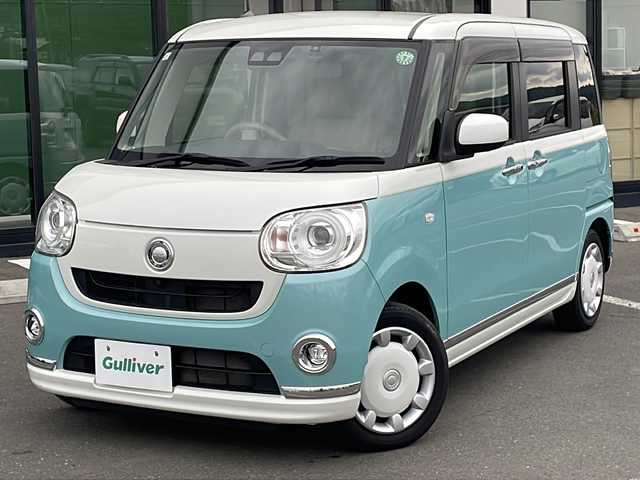 ダイハツ ムーヴ キャンバス G メイクアップ リミテッド　SAⅢ 道東・釧路十勝 2019(平31)年 5.8万km パールホワイトⅢ/ファインミントメタリック 2トーン ・４WD/・純正メモリナビ/（ＢＴ　ＣＤ　ＤＶＤ　ＵＳＢ）/・全方位カメラ　　/・両側パワースライドドア/・衝突被害軽減ブレーキ/・横滑り防止装置　/・オートライト/・オートマチックハイビーム/・ＬＥＤヘッドライト/・ＥＴＣ　/・運転席シートヒーター/・スマートキー/・プッシュスタート/・純正フロアマット/・テレビキャンセラー/・フロントワイパーデアイサー