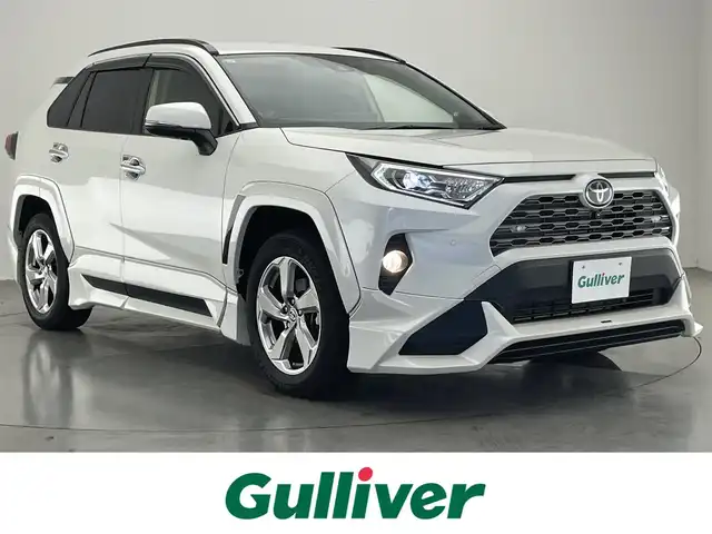 トヨタ ＲＡＶ４ ハイブリットG 愛知県 2021(令3)年 1.6万km ホワイトパールクリスタルシャイン 純正９型ナビ　ＴＲＤ　全方位　ＢＳＭ　禁煙車　純正ツィーター　ルーフレール　ワイヤレス充電　デジイン　セーフティセンス　ＥＴＣ　ドラレコ　黒革　ＬＥＤオートライト　電動リヤゲート　追従クルコン　フォグ