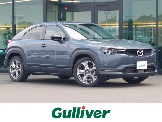 マツダ ＭＸ－３０ 東京都 2021(令3)年 1.7万km ポリメタルグレーM 純正ナビ/フルセグ/360°ビューモニター/ヘッドアップディスプレイ/ビルトインETC/ドライブレコーダー/シートヒーター/ステアリングヒーター/パワーシート/パドルシフト/衝突軽減ブレーキ/レーンキープアシスト/レーダークルーズコントロール/コーナーセンサー/オートマチックハイビーム/スマートキー