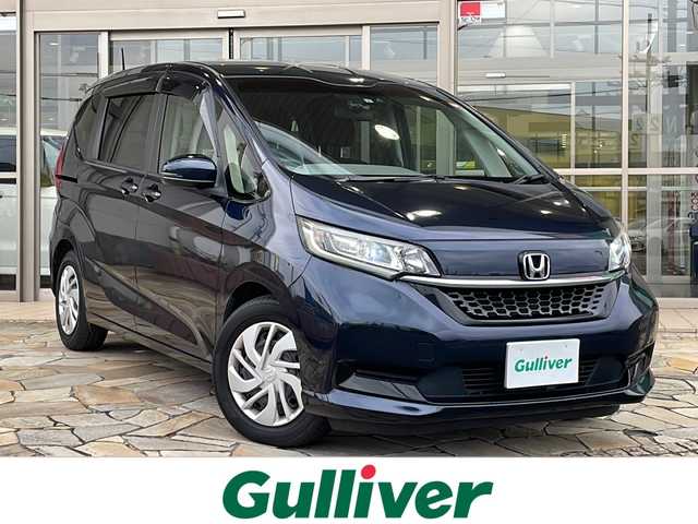 ホンダ フリード G ホンダセンシング 静岡県 2021(令3)年 7.7万km ミッドナイトブルービームM 純正SDナビ/・CD/・DVD/・フルセグＴＶ/・Bluetooth/・USB/・AM/・FM/主要装備/・両側パワスラ/・衝突軽減/・レーンキープ/・追従クルコン/・バックカメラ/・ETC/・ドラレコ前/・シートヒーターD/N席/・純正フロアマット/・LEDヘッドライト/・オートライト/・スマートキー/・プッシュスタート