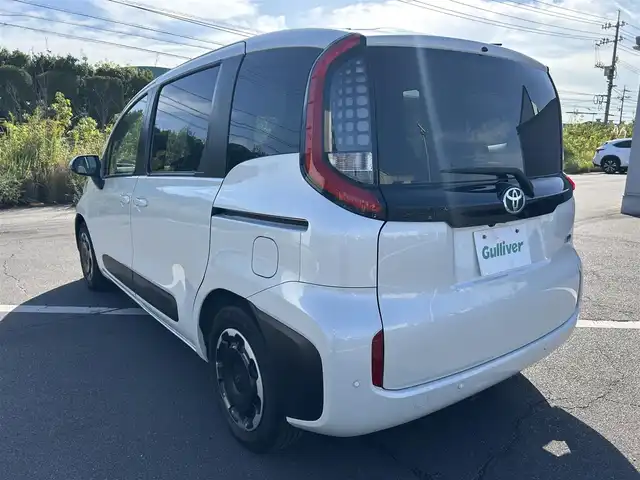 トヨタ シエンタ ハイブリッド Z 岡山県 2022(令4)年 3.2万km ホワイトパールクリスタルシャイン 登録時走行距離31957km/純正ナビ/フルセグTV(AM.FM.TV.BT)/両側パワースライドドア/パノラミックビューモニター/ビルトインETC/前後ドライブレコーダー/クリアランスソナー/衝突軽減ブレーキ/横滑り防止装置/クルーズコントロール(追従走行あり)/車線逸脱警報（レーンキープアシスト）/LEDヘッドライト/オートライト/オートマチックハイビーム/アイドリングストップ/純正フロアマット/プッシュスタート/スマートキー