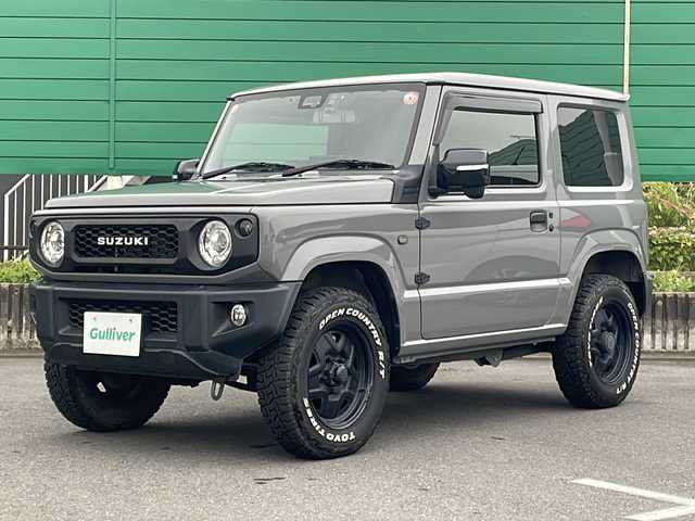 スズキ ジムニー XC 茨城県 2020(令2)年 4.2万km ミディアムグレー ワンオーナー/社外9型ナビ/ビルトインETC/シートヒーター/ドライブレコーダ/バックカメラ/LEDヘッドライト/横滑り防止装置/衝突軽減システム/オートライト/純正16インチアルミホイール/純正フロアマット/４WD/スマートキー