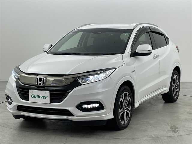 ホンダ ヴェゼル ハイブリッド Z ホンダセンシング 福岡県 2018(平30)年 3.3万km プラチナホワイトパール 社外８型ナビ（フルセグＴＶ）　/バックカメラ　/ビルトインＥＴＣ　/前方ドラレコ　/アダプティブクルコン　/衝突軽減　/レーンキープ　/パドルシフト　/ハーフレザー　/シートヒーター　/純正１７インチＡＷ　/ＬＥＤライト/ルーフレール