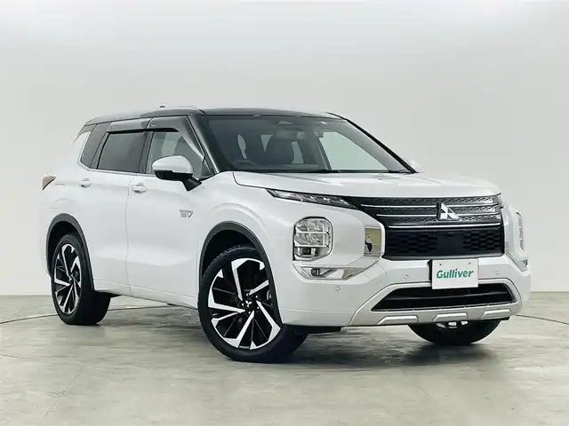 三菱 アウトランダー ＰＨＥＶ P 福島県 2022(令4)年 2.3万km パールⅡ e-Assist/・マイパイロット/・衝突軽減ブレーキ/・レーンキープアシスト/・ブラインドスポットモニター/・クリアランスソナー/純正ナビ/・フルセグTV/Bluetooth/USB/・全方位カメラ/・ETC/・ドライブレコーダー/アイドリングストップ/電子パーキング/・オートホールド/革巻きステアリング/・ステアリングリモコン/・ステアリングヒーター/レザーシート/・パワーシート(運転席/助手席)/・シートヒーター(全席)/プッシュスタート/・スマートキー/・スペアキー/LEDヘッドライト/・オートライト/・フォグライト/電動格納ミラー/ドアバイザー