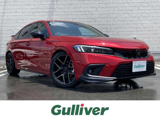ホンダ シビック EX 静岡県 2023(令5)年 2.8万km プレミアムクリスタルレッドM HondaSENSING/純正メモリーナビ/　AM FM Bluetooth USB/ビルトインETC2.0/バックモニター/前後方ドライブレコーダー/LEDオートヘッドランプ/レーダークルーズコントロール/ハーフレザーシート/シートヒーター(前席)/ワイヤレス充電/前後方クリアランスソナー/純正18インチアルミホイール/ターボ/社外柿本改マフラー/6速MT/BOSEプレミアムサウンド/フルセグTV/パワーシート(前席)