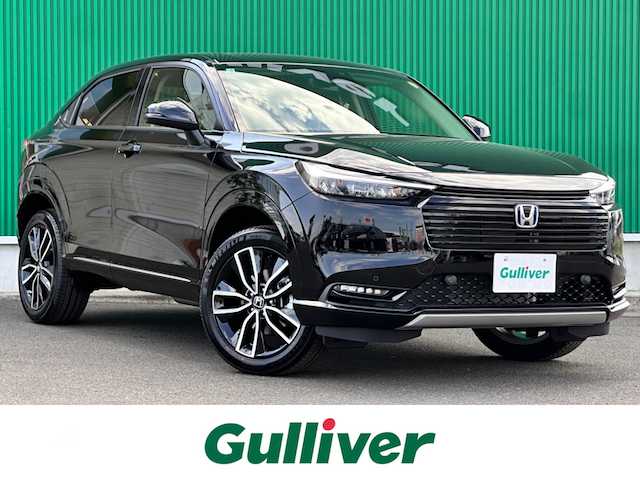 ホンダ ヴェゼル ハイブリッド e:HEV Z 宮城県 2025(令7)年 0.1万km未満 クリスタルブラックパール e:HEV Z　4WD/Honda CONNECTディスプレー/+ETC2.0車載器/+ワイヤレス充電器/後退出庫サポート/＝＝＝/ホンダセンシング/●衝突軽減ブレーキ（CMBS）/●先行車発進お知らせ機能/●歩行者事故低減ステアリング/●路外逸脱抑制機能/●標識認識機能/●渋滞追従機能付アダプティブクルーズコントロール/●車線維持支援システム（LKAS）/●トラフィックジャムアシスト（渋滞運転支援機能）/●誤発進抑制機能/●後方誤発進抑制機能/●近距離衝突軽減ブレーキ/●急アクセル抑制機能/●パーキングセンサーシステム/●アダプティブドライビングビーム/ブラインドスポットインフォメーション/熱戦入りフロントウィンドウ/親水/ヒーテッドドアミラー/ハンズフリーアクセスパワーテールゲート(予約クローズ機能付)/ハーフレザーシート/前席シートヒーター/LEDヘッドランプ/LEDシーケンシャルターンシグナルランプ/フォグランプ/オートライト/電動パーキングブレーキ/ブレーキホールド/純正18インチAW/W/サイド/カーテンエアバッグ