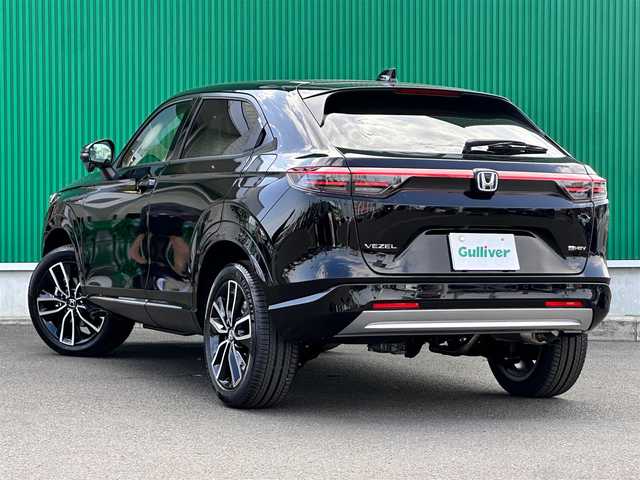 ホンダ ヴェゼル ハイブリッド e:HEV Z 宮城県 2025(令7)年 0.1万km未満 クリスタルブラックパール e:HEV Z　4WD/Honda CONNECTディスプレー/+ETC2.0車載器/+ワイヤレス充電器/後退出庫サポート/＝＝＝/ホンダセンシング/●衝突軽減ブレーキ（CMBS）/●先行車発進お知らせ機能/●歩行者事故低減ステアリング/●路外逸脱抑制機能/●標識認識機能/●渋滞追従機能付アダプティブクルーズコントロール/●車線維持支援システム（LKAS）/●トラフィックジャムアシスト（渋滞運転支援機能）/●誤発進抑制機能/●後方誤発進抑制機能/●近距離衝突軽減ブレーキ/●急アクセル抑制機能/●パーキングセンサーシステム/●アダプティブドライビングビーム/ブラインドスポットインフォメーション/熱戦入りフロントウィンドウ/親水/ヒーテッドドアミラー/ハンズフリーアクセスパワーテールゲート(予約クローズ機能付)/ハーフレザーシート/前席シートヒーター/LEDヘッドランプ/LEDシーケンシャルターンシグナルランプ/フォグランプ/オートライト/電動パーキングブレーキ/ブレーキホールド/純正18インチAW/W/サイド/カーテンエアバッグ