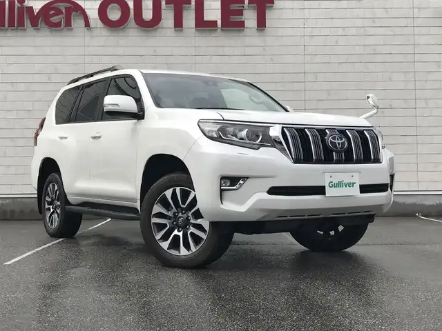 トヨタ ランドクルーザー プラド TX Lパッケージ 富山県 2022(令4)年 2.8万km ホワイトパールクリスタルシャイン 純正９型ナビ（Ｙ６８Ｔ）/フルセグＴＶ／Bluetooth/サンルーフ/黒革シート/シートヒーター／シートクーラー/バックカメラ/セーフティセンス/レーダークルーズコントロール/純正１９ＡＷ/ＬＥＤライト/７人乗り/ETC/オートマチックハイビーム/スマートキー/プッシュスタート/W＋サイドエアバック/カーテンエアバック/保証書／取説あり/スペアキー1本