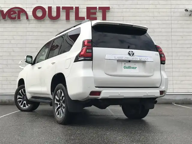 トヨタ ランドクルーザー プラド TX Lパッケージ 富山県 2022(令4)年 2.8万km ホワイトパールクリスタルシャイン 純正９型ナビ（Ｙ６８Ｔ）/フルセグＴＶ／Bluetooth/サンルーフ/黒革シート/シートヒーター／シートクーラー/バックカメラ/セーフティセンス/レーダークルーズコントロール/純正１９ＡＷ/ＬＥＤライト/７人乗り/ETC/オートマチックハイビーム/スマートキー/プッシュスタート/W＋サイドエアバック/カーテンエアバック/保証書／取説あり/スペアキー1本