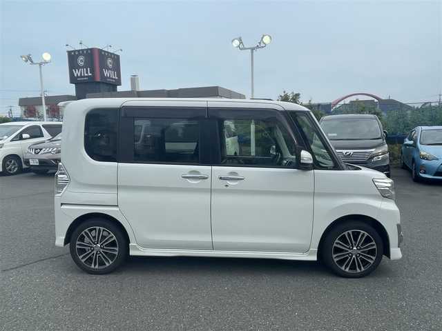 ダイハツ タント カスタム RS SA 東京都 2014(平26)年 8.8万km パールホワイトⅢ (株)IDOMが運営する【じしゃロン昭島店】の自社ローン専用車両になりますこちらは現金またはオートローンご利用時の価格です。自社ローンご希望の方は別途その旨お申付け下さい/純正ナビ/BT/TV/SD/CD/DVD/ETC/バックカメラ/プッシュスタート/スマートキー/フリップダウンモニター/両側パワースライドドア/ステアリングスイッチ/Autoライト/LED