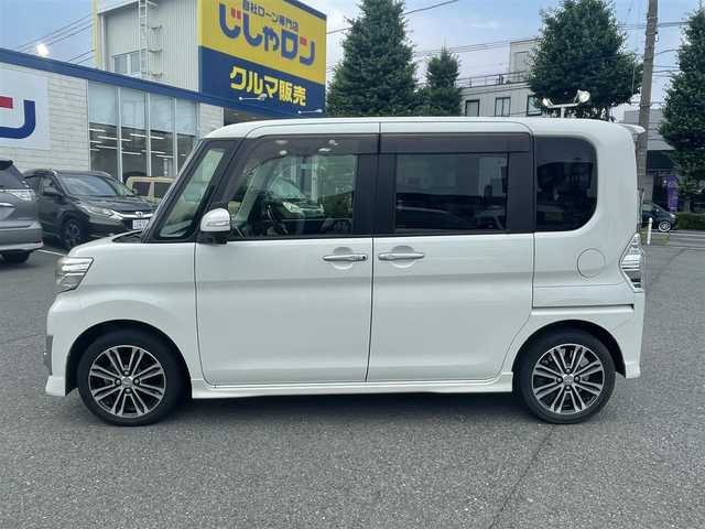 ダイハツ タント カスタム RS SA 東京都 2014(平26)年 8.8万km パールホワイトⅢ (株)IDOMが運営する【じしゃロン昭島店】の自社ローン専用車両になりますこちらは現金またはオートローンご利用時の価格です。自社ローンご希望の方は別途その旨お申付け下さい/純正ナビ/BT/TV/SD/CD/DVD/ETC/バックカメラ/プッシュスタート/スマートキー/フリップダウンモニター/両側パワースライドドア/ステアリングスイッチ/Autoライト/LED