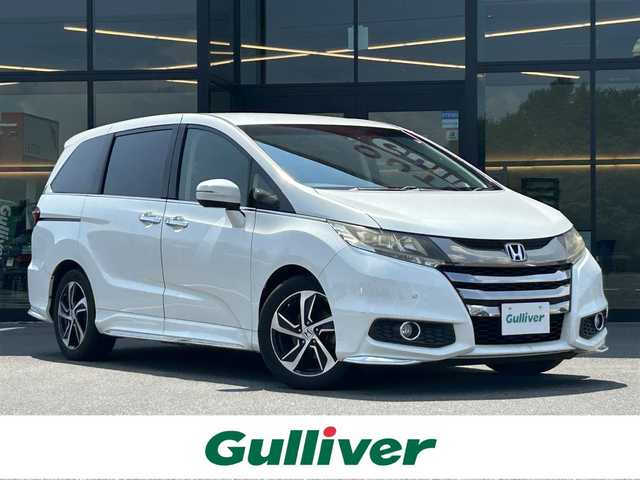 ホンダ オデッセイ アブソルート 栃木県 2015(平27)年 6.6万km ホワイトオーキッドパール ホンダセンシング/・SMBS(衝突軽減ブレーキ)/・誤発進抑制機能/・先行車発進お知らせ機能/・標識認識機能/・LKAS(車線維持支援システム）/・路外逸脱抑制機能/・ACC(アダプティブクルーズコントロール)/純正ナビ/フルセグTV/DVD/Bluetooth/USB/HDMI/バックカメラ/ビルトインETC/ミラー型前後ドライブレコーダー/純正フリップダウンモニター/パドルシフト/コーナーセンサー/ハーフレザーシート