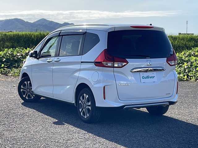 ホンダ フリード クロスター ホンダセンシング 新潟県 2020(令2)年 3.3万km プラチナホワイトパール 4WD/純正インターナビ(VXM-204VFi)/CD/DVD/BT/フルセグテレビ/SDミュージックサーバー/バックカメラ/ETC/ドライブレコーダー/衝突被害軽減ブレーキ/レーンキープアシスト/レーダークルーズコントロール/両側パワースライドドア/半革シート/シートヒーター /ステアリングスイッチ/スマートキー/プッシュスタート/LEDヘッドライト/オートライト/フォグランプ/純正15インチアルミホイール