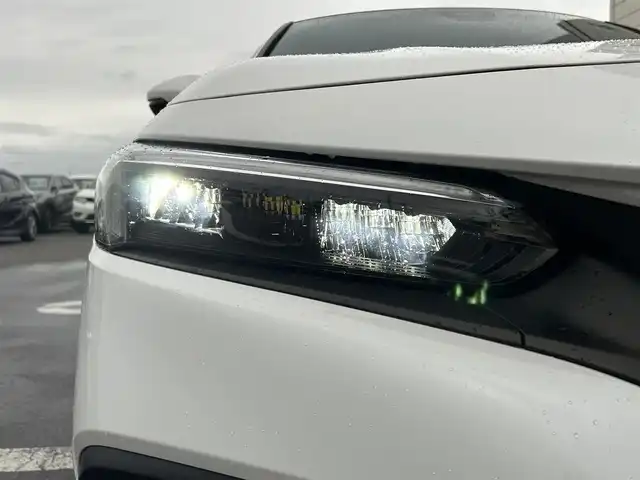 ホンダ シビック LX 静岡県 2022(令4)年 4.3万km プラチナホワイトパール HondaSENSING/Google搭載9インチHonda CONNECTナビ/　AM FM Bluetooth USB AppleCarPlay AndroidAuto/フルセグTV/バックモニター/前後方ドライブレコーダー/LEDオートヘッドライト/レーダークルーズコントロール/ハーフレザーシート/シートヒーター(前席)/純正18インチアルミホイール/スマートキー2本/前後方クリアランスソナー/パドルシフト/ワンオーナー/リアウイング/ビルトインETC2.0