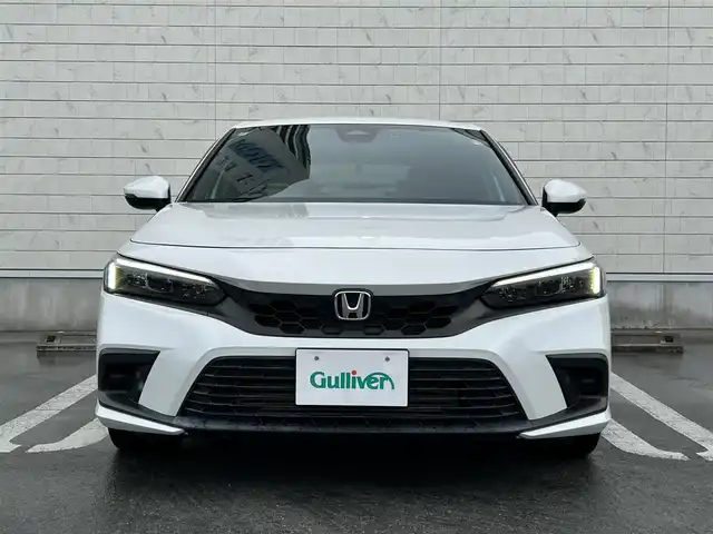 ホンダ シビック LX 静岡県 2022(令4)年 4.3万km プラチナホワイトパール HondaSENSING/Google搭載9インチHonda CONNECTナビ/　AM FM Bluetooth USB AppleCarPlay AndroidAuto/フルセグTV/バックモニター/前後方ドライブレコーダー/LEDオートヘッドライト/レーダークルーズコントロール/ハーフレザーシート/シートヒーター(前席)/純正18インチアルミホイール/スマートキー2本/前後方クリアランスソナー/パドルシフト/ワンオーナー/リアウイング/ビルトインETC2.0