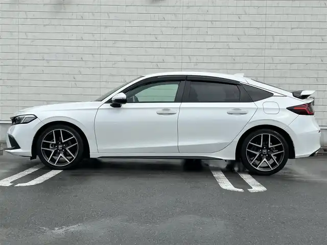 ホンダ シビック LX 静岡県 2022(令4)年 4.3万km プラチナホワイトパール HondaSENSING/Google搭載9インチHonda CONNECTナビ/　AM FM Bluetooth USB AppleCarPlay AndroidAuto/フルセグTV/バックモニター/前後方ドライブレコーダー/LEDオートヘッドライト/レーダークルーズコントロール/ハーフレザーシート/シートヒーター(前席)/純正18インチアルミホイール/スマートキー2本/前後方クリアランスソナー/パドルシフト/ワンオーナー/リアウイング/ビルトインETC2.0