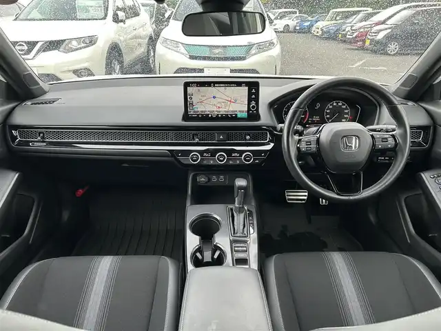 ホンダ シビック LX 静岡県 2022(令4)年 4.3万km プラチナホワイトパール HondaSENSING/Google搭載9インチHonda CONNECTナビ/　AM FM Bluetooth USB AppleCarPlay AndroidAuto/フルセグTV/バックモニター/前後方ドライブレコーダー/LEDオートヘッドライト/レーダークルーズコントロール/ハーフレザーシート/シートヒーター(前席)/純正18インチアルミホイール/スマートキー2本/前後方クリアランスソナー/パドルシフト/ワンオーナー/リアウイング/ビルトインETC2.0