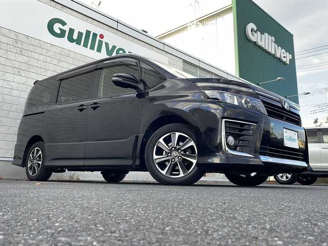 トヨタ ヴォクシー ZS 茨城県 2014(平26)年 9.9万km ブラック ワンオーナー/純正SDナビ/　　BT/CD/DVD/フルセグ/バックカメラ/フリップダウンモニター/両側パワースライドドア/LEDオートライト/純正16インチアルミホイール/コーナーセンサー/アイドリングストップ/スマートキー/ETC