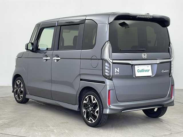ホンダ Ｎ ＢＯＸ カスタム G L ターボ ホンダセンシング 鹿児島県 2020(令2)年 5.4万km シャイニンググレーM ホンダセンシング/純正8型プレミアムインターナビ/Bluetooth DVD再生可/フルセグTV/バックカメラ/両側電動スライドドア/レーダークルーズコントロール/ビルトインETC/ハーフレザーシート/前席シートヒーター /ビルトインETC/LEDヘッドライト/フォグライト /オートライトコントロール/革巻ステアリング/ステアリングスイッチ/レーンキープアシスト/純正15インチアルミホイール/バックセンサー/スマートキー/エンジンプッシュスタート/純正フロアマット/ドアバイザー/保証書