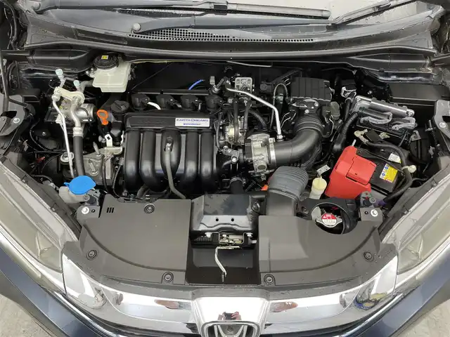 ホンダ シャトル ハイブリッド X 滋賀県 2015(平27)年 6.8万km ミッドナイトブルービームM 禁煙車/純正ナビ/(CD/DVD/SD/Bluetooth/フルセグTV)/バックカメラ/ビルトインETC/シティーブレーキアクティブシステム/革巻きステアリング/クルーズコントロール/ステアリングリモコン/パドルシフト/ハーフレザーシート/LEDヘッドライト/オートヘッドライト/純正フロアマット/スペアキー