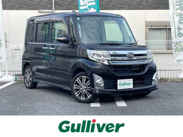 ダイハツ タント カスタム RS SA 三重県 2014(平26)年 12.7万km ブラックマイカメタリック 登録時126793km/純正ナビ/(AM/FM/TV/USB/CD/DVD/Bluetooth)/ワンセグTV/ETC/バックカメラ/両側パワースライドドア/アイドリングストップ/フォグランプ/LED/オートライト/純正フロアマット/純正ホイール/プリクラッシュ/横滑り防止装置/ステアリングスイッチ/ドアバイザー/電格ミラー/プッシュスタート/スマートキー