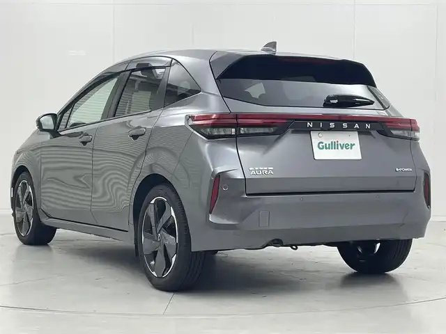 日産 オーラ G 茨城県 2024(令6)年 1.2万km ダークメタルグレー 純正9型ナビ/全周囲カメラ/フルセグ/デジタルインナーミラー/衝突被害軽減ブレーキ/車線逸脱抑制装置/BSW/オートマチックハイビーム/ソナー/ETC/ドラレコ/純正15インチAW/LEDヘッドライト/スマートキー