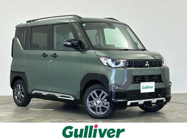 三菱 デリカミニ T プレミアム 群馬県 2025(令7)年 0.1万km未満 緑Ⅱ 届出済未使用車　純正９インチディスプレイオーディオ　全方位カメラ　ルーフレール　レーダークルーズコントロール　レーンキープアシスト　衝突軽減ブレーキ　ダウンヒルアシスト　ハンドルヒーター　ＬＥＤライト