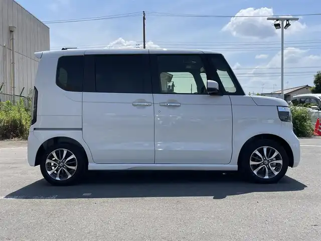 ホンダ Ｎ ＢＯＸ カスタム 東京都 2025(令7)年 0.2万km プラチナホワイトパール 純正ナビ/バックモニター/衝突軽減ブレーキ/路外逸脱抑制機能/パーキングセンサー/レーダークルーズ/シートヒーター/片側電動スライドドア/ＥＴＣ/ステアリングスイッチ/ＥＣＯＮモード/スマートキー