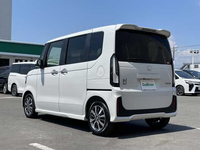 ホンダ Ｎ ＢＯＸ カスタム 東京都 2025(令7)年 0.2万km プラチナホワイトパール 純正ナビ/バックモニター/衝突軽減ブレーキ/路外逸脱抑制機能/パーキングセンサー/レーダークルーズ/シートヒーター/片側電動スライドドア/ＥＴＣ/ステアリングスイッチ/ＥＣＯＮモード/スマートキー