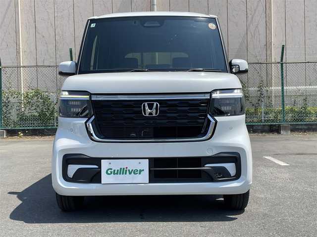 ホンダ Ｎ ＢＯＸ カスタム 東京都 2025(令7)年 0.2万km プラチナホワイトパール 純正ナビ/バックモニター/衝突軽減ブレーキ/路外逸脱抑制機能/パーキングセンサー/レーダークルーズ/シートヒーター/片側電動スライドドア/ＥＴＣ/ステアリングスイッチ/ＥＣＯＮモード/スマートキー
