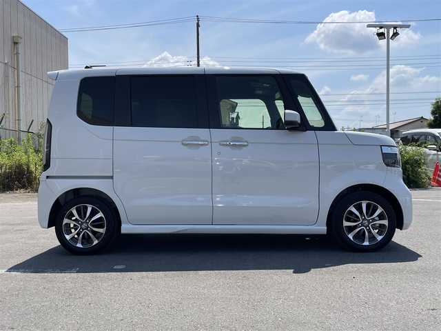ホンダ Ｎ ＢＯＸ カスタム 東京都 2025(令7)年 0.2万km プラチナホワイトパール 純正ナビ/バックモニター/衝突軽減ブレーキ/路外逸脱抑制機能/パーキングセンサー/レーダークルーズ/シートヒーター/片側電動スライドドア/ＥＴＣ/ステアリングスイッチ/ＥＣＯＮモード/スマートキー