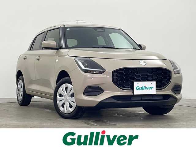 スズキ スイフト XG 秋田県 2023(令5)年 0.3万km キャラバンアイボリーPM 4WD/ヂュアルセンサーブレーキサポートII/レーダークルーズコントロール　/横滑り防止装置　/レーンキープアシスト　/前後クリアランスソナー　/前席シートヒーター　/ＬＥＤヘッドライト　/オートライト　/プッシュスタート　/スペアキー/ワンオーナー/プッシュスタート/電動格納ミラー/純正フロアマット