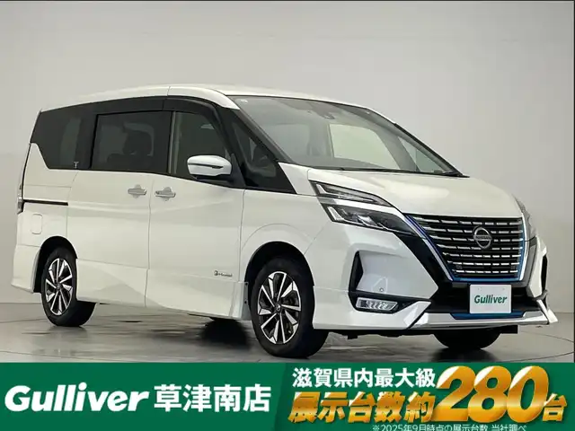 日産 セレナ e－パワー ハイウェイスター G 滋賀県 2019(令1)年 6.6万km ブリリアントホワイトパール 純正9インチナビ/【Bluetooth/CD/DVD/Bru-ray/フルセグTV/HDMI】/寒冷地仕様車/純正フリップダウンモニター/両側パワースライドドア/全方位カメラ/レザーシート/プロパイロット/レーンディパーチャーワーニング/レーンディパーチャープリベンション/ブラインドスポットワーニング/ブラインドスポットインターベンション/LEDヘッドライト/オートマチックハイビーム/パーキングアシスト/ビルトインETC/前後ドライブレコーダー/D/Nシートヒーター/ステアリングヒーター/電動パーキングブレーキ/オートマブレーキホールド/デジタルインナーミラー/純正フロアマット/プッシュスタート/スマートキー/ステアリングリモコン