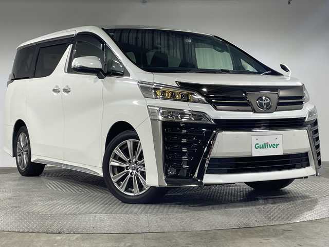 トヨタ ヴェルファイア ゴールデンアイズⅡ 神奈川県 2021(令3)年 3.1万km ホワイトパールクリスタルシャイン 純正9型ディスプレイオーディオ/純正12.1型フリップダウンモニター/車載ナビ/Bluetooth　CD DVD　USB　Miracast/バックカメラ/デジタルインナーミラー/パワーバックドア/両側電動スライドドア/セーフティセンス/レーダークルーズコントロール/レーンディパーチャーアラート/プリクラッシュセーフティ/オートハイビーム/ブラインドスポットモニター/前後ソナー/SOSコール/純正ビルトインETC2.0/社外前後ドライブレコーダー/ハーフレザーシート/革巻きステアリング/ステアリングスイッチ/ECOモード/電動パーキングブレーキ/オートブレーキホールド/プッシュスタート/スマートキー/3眼LEDヘッドライト/フロントフォグランプ/オートライト/純正リアスポイラー/純正18インチアルミホイール