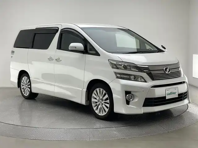 トヨタ ヴェルファイア 2．4Z 兵庫県 2012(平24)年 7.6万km ホワイトパールクリスタルシャイン ・社外HDDナビ/・CD/DVD/HDD/SD/BT/・バックカメラ/・ビルドインETC/・社外フリップダウンモニター/・両側パワースライドドア/・HIDヘッドライト/・フォグランプ/・オートライト/・純正18インチアルミホイール/・純正フロアマット/・コーナーセンサー/・スマートキー