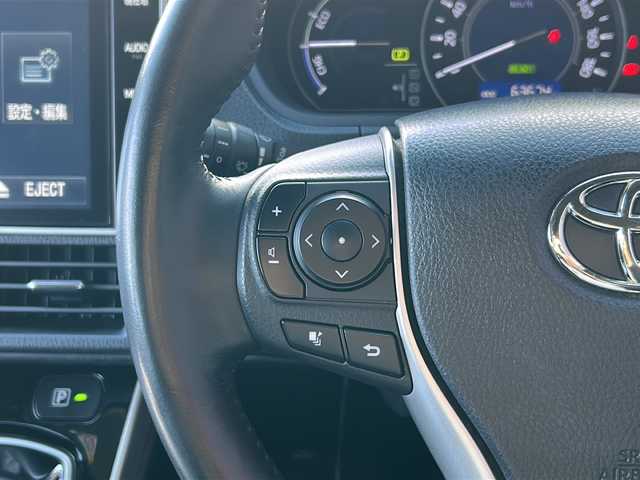 トヨタ ヴォクシー ハイブリッド ZS 煌 広島県 2018(平30)年 6.4万km ブラッキッシュアゲハガラスフレーク 禁煙車/トヨタセーフティセンス/・プリクラッシュセーフティ/・先行車発進告知/・オートマチックハイビーム/・LDA/クルーズコントロール/コーナーセンサー/純正10インチナビ（NSZN-Z66T）/・CD/DVD/フルセグ/Bluetooth/SD/REC/純正フリップダウンモニター（V12T-R66C）/バックカメラ/両側パワースライドドア/革巻きステアリング/オートライト/ステアリングスイッチ/D/Nシートヒーター/LEDヘッドライト/フォグランプ/サンシェード/ビルトインETC/純正フロアマット/純正ドアバイザー/スマートキー/プッシュスタート/スペアキー/純正16インチアルミホイール