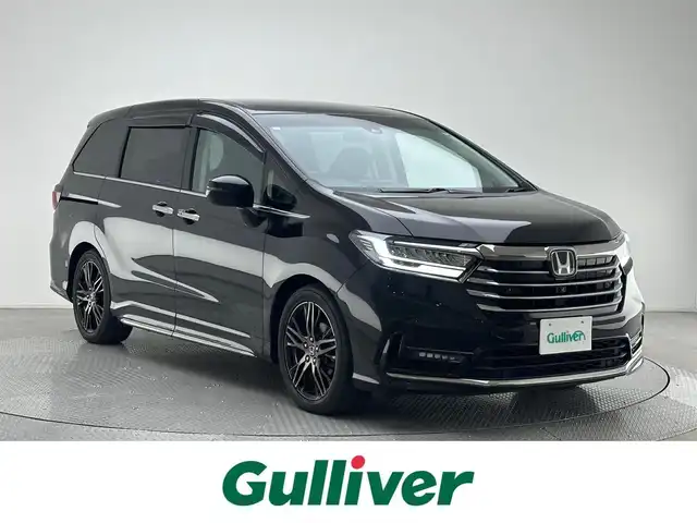 ホンダ オデッセイ アブソルート EX 大阪府 2021(令3)年 4.2万km プレミアムスパークルブラックパール ・純正10インチナビ/・全方位カメラ/・フリップダウンモニター/・ビルドインETC2.0/・両側パワースライドドア/・パワーバックドア/・パワーシートD/N/・シートヒーターD/N/・純正前後ドライブレコーダー/・ホンダセンシング/・衝突軽減ブレーキ/・レーンキープアシスト/・追従クルーズコントロール/・ブラインドスポットモニター/・前後コーナーセンサー/・パドルシフト/・LEDヘッドライト/・LEDフォグランプ/・オートライト/・純正18インチアルミホイール/・純正フロアマット/・ドアバイザー/・2列目オットマン/・プッシュスタート/・スマートキー/・リモコンエンジンスターター