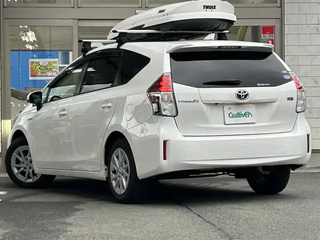 トヨタ プリウス α G 岩手県 2017(平29)年 6.5万km スーパーホワイトⅡ 純正ナビNSZT-Y66T/バックカメラ /ハーフレザーシート /フルセグTV /フロントカメラ /レーダークルコン/衝突軽減装置 /運転席パワーシート /ビルトインETC /社外ドラレコ /社外GPSレーダー /オートハイビーム/オートライト/フォグランプ/オールオートPW/革巻きステアリング/ナビステアリングスイッチ/純正エンジンスターター/スマートキー×2/リアワイパー/ルーフボックスTHULE/社外AWスタッドレスタイヤ/(205/60/R16　2024年製7分山)/ドアバイザー/フロアマット/保証書　取説　ナビ取説