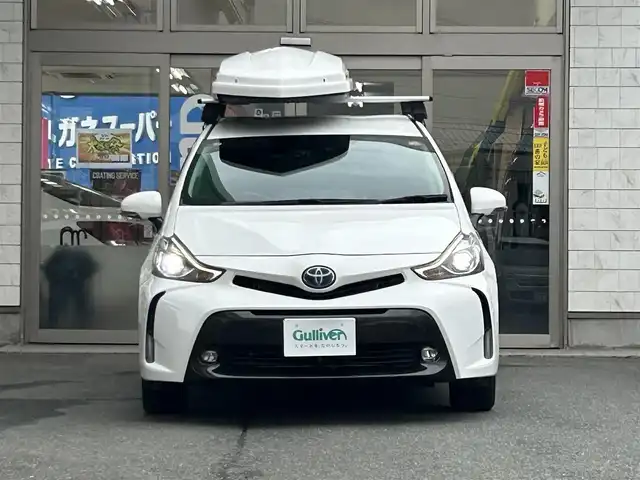 トヨタ プリウス α G 岩手県 2017(平29)年 6.5万km スーパーホワイトⅡ 純正ナビNSZT-Y66T/バックカメラ /ハーフレザーシート /フルセグTV /フロントカメラ /レーダークルコン/衝突軽減装置 /運転席パワーシート /ビルトインETC /社外ドラレコ /社外GPSレーダー /オートハイビーム/オートライト/フォグランプ/オールオートPW/革巻きステアリング/ナビステアリングスイッチ/純正エンジンスターター/スマートキー×2/リアワイパー/ルーフボックスTHULE/社外AWスタッドレスタイヤ/(205/60/R16　2024年製7分山)/ドアバイザー/フロアマット/保証書　取説　ナビ取説