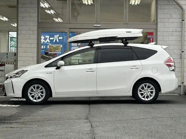 トヨタ プリウス α G 岩手県 2017(平29)年 6.5万km スーパーホワイトⅡ 純正ナビNSZT-Y66T/バックカメラ /ハーフレザーシート /フルセグTV /フロントカメラ /レーダークルコン/衝突軽減装置 /運転席パワーシート /ビルトインETC /社外ドラレコ /社外GPSレーダー /オートハイビーム/オートライト/フォグランプ/オールオートPW/革巻きステアリング/ナビステアリングスイッチ/純正エンジンスターター/スマートキー×2/リアワイパー/ルーフボックスTHULE/社外AWスタッドレスタイヤ/(205/60/R16　2024年製7分山)/ドアバイザー/フロアマット/保証書　取説　ナビ取説
